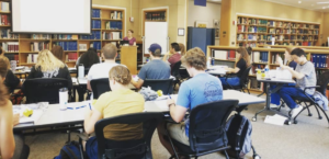 Presentation in library with a group of students